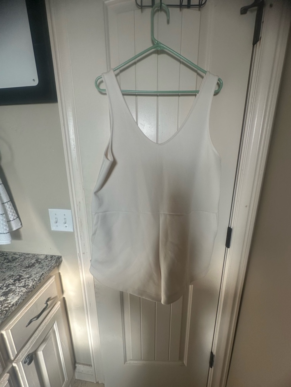 Sleeveless Cream V-Neck Romper